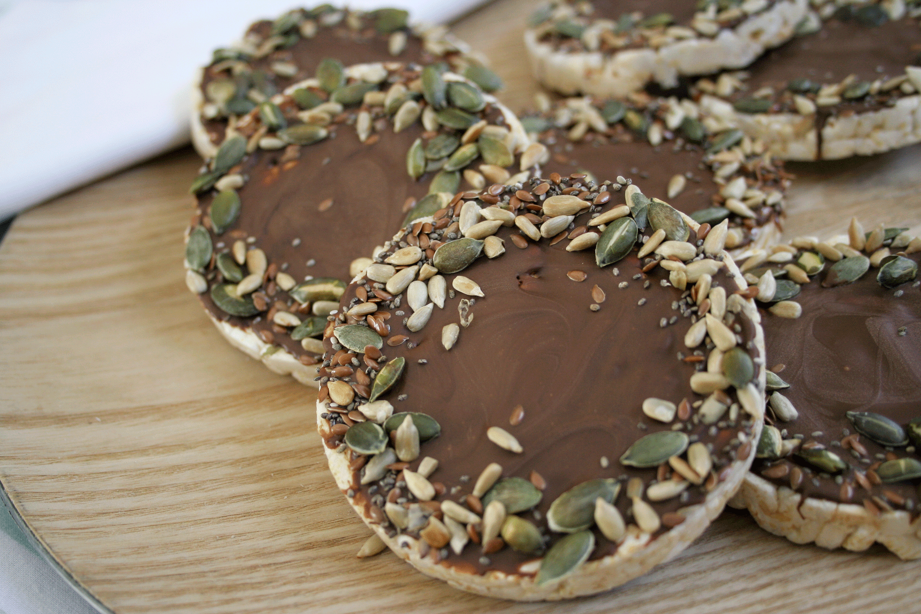 Dark Chocolate Covered Rice Cakes with Mixed Seeds